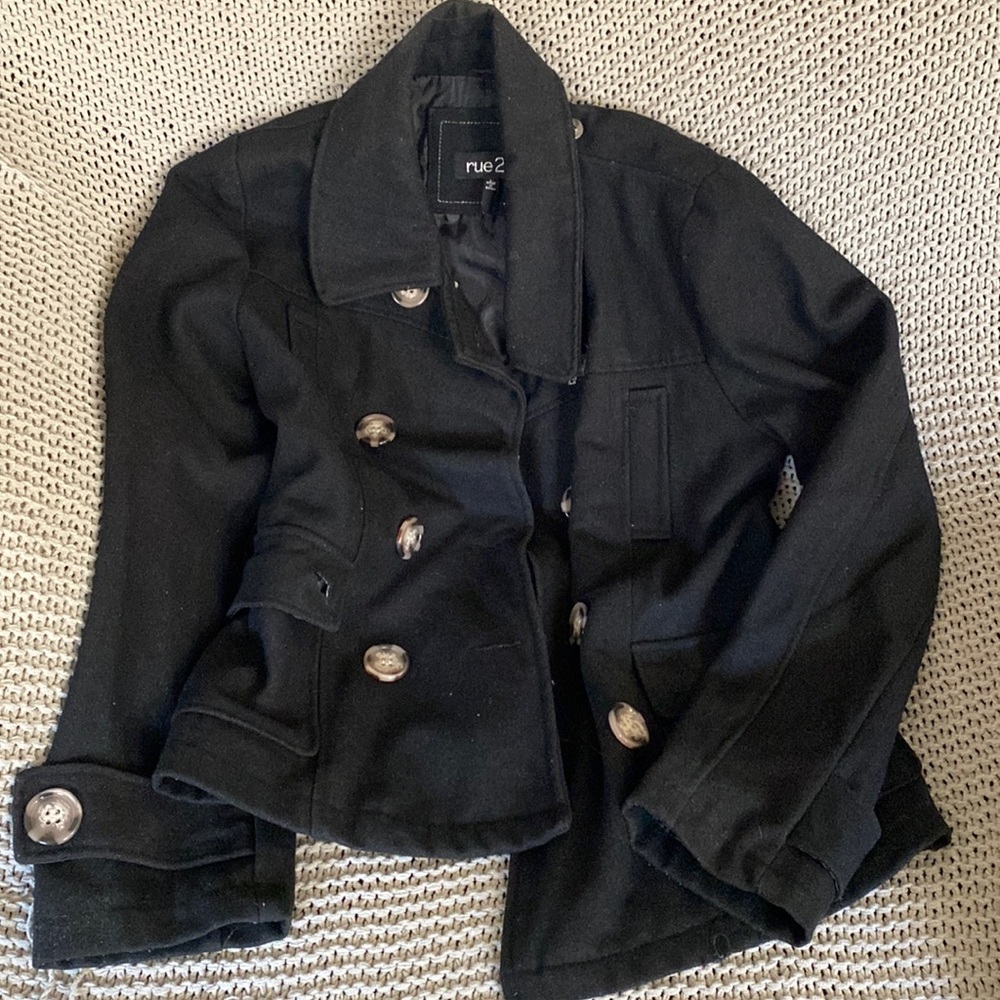 Junior’s large black jacket